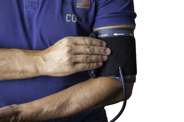 a man takes blood pressure